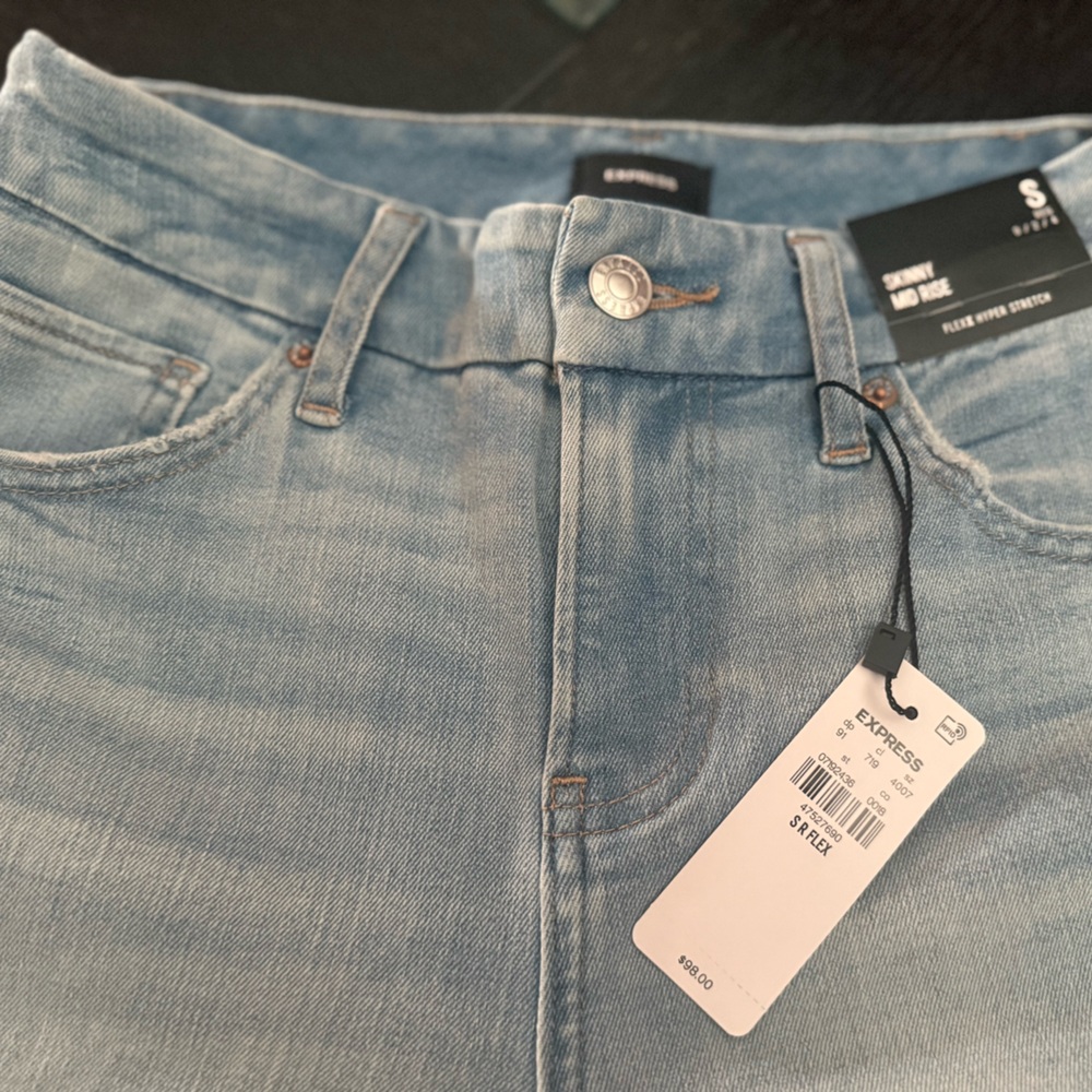 Express Mid Rise Light Wash FlexX Ripped
Skinny Jeans - Picture 4 of 7